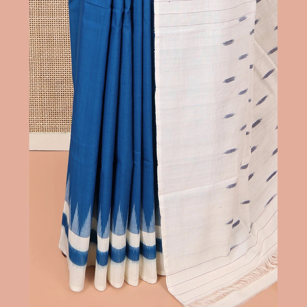 Pothys Blue Plain Ikkat Cotton Saree, Complemented by a Contrast Ikkat Temple Border, Pallu Steeped with Buttas, and Paired with a Contrast Blouse