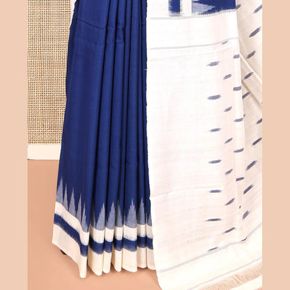 Pothys Navy Blue Blue Plain Ikkat Cotton Saree, Complemented by a Contrast Ikkat Temple Border, Pallu Steeped with Buttas, and Paired with a Contrast Blouse