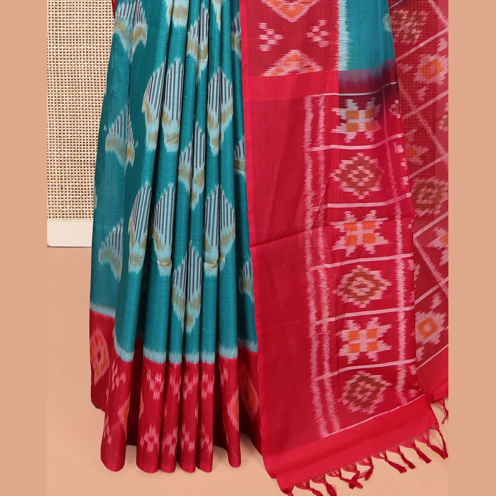 Pothys Blue Ikkat Cotton Saree, Decorated with Ikkat-style Buttas All Over Its Body, Complemented by a Contrast Ikkat-Textured Border, Pallu of Butta Enclosed Checks, and Paired with a Contrast Blouse