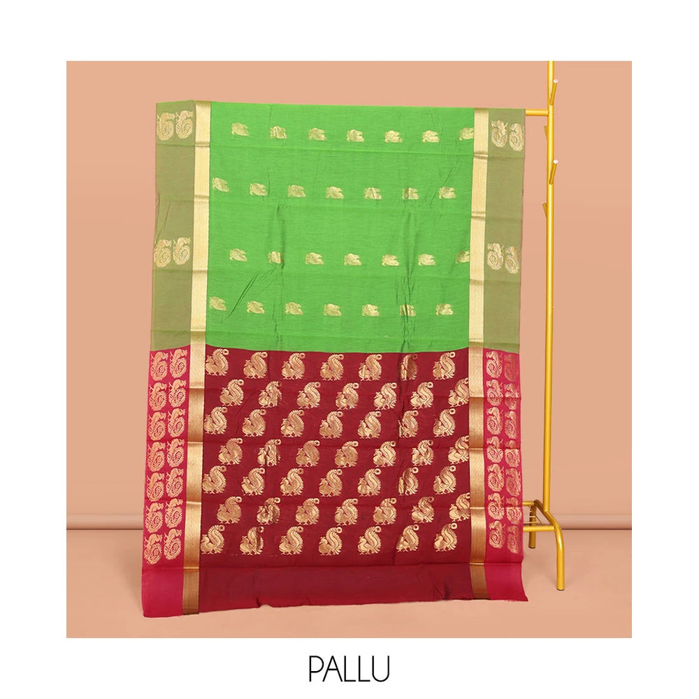 Pothys Green Semi-Silk Cotton Saree, Decked Up with Peacock Buttas All Over Its Body, Highlighted by a Zari Border, Pallu Artfully Woven with Peacock Designs, and Paired with a Contrast Blouse