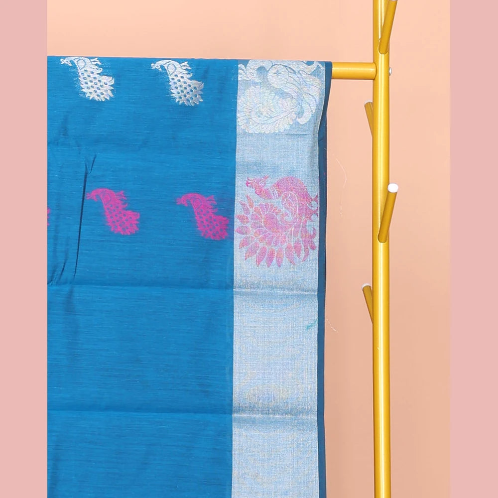Pothys Blue Semi-Silk Cotton Saree, Adorned with Peacock Buttas All Over Its Body, Highlighted by a Self-Border of Peacocks, Pallu Steeped with Peacock Designs, and Paired with a Matching Blouse