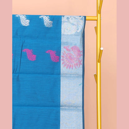 Pothys Blue Semi-Silk Cotton Saree, Adorned with Peacock Buttas All Over Its Body, Highlighted by a Self-Border of Peacocks, Pallu Steeped with Peacock Designs, and Paired with a Matching Blouse