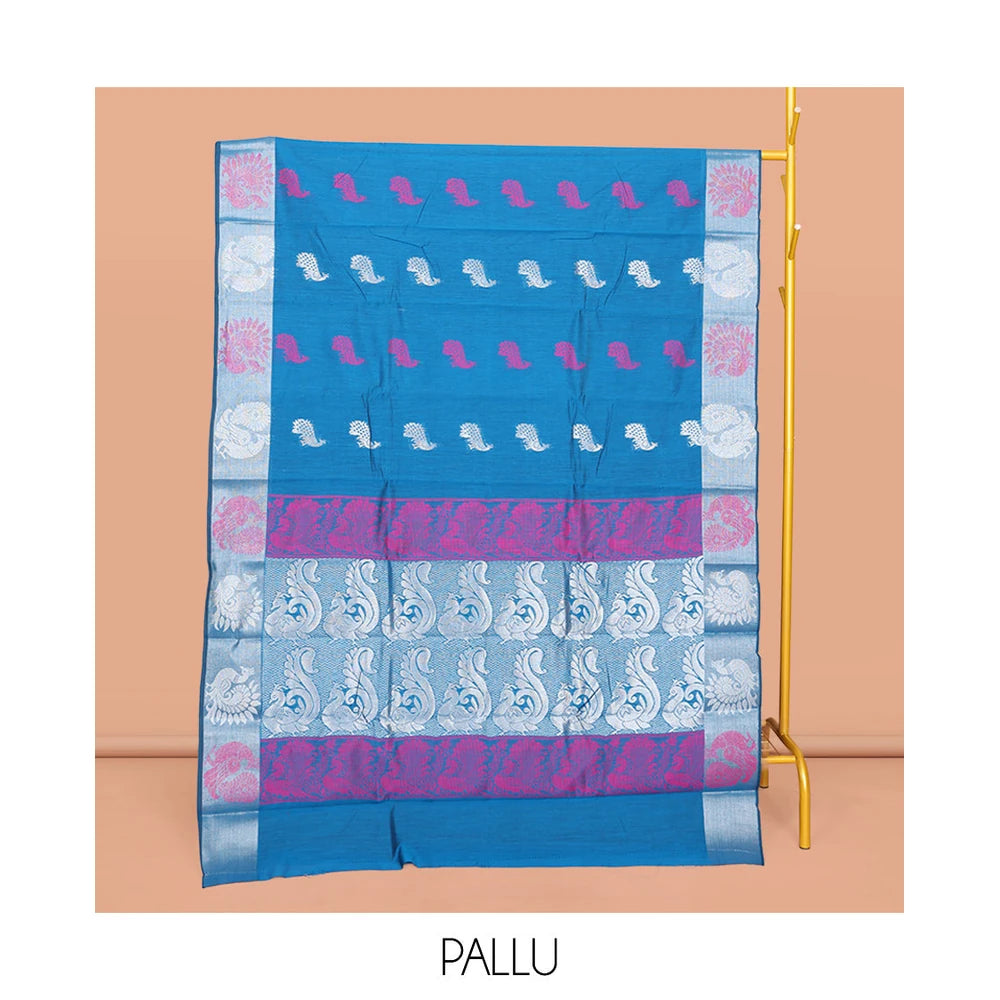 Pothys Blue Semi-Silk Cotton Saree, Adorned with Peacock Buttas All Over Its Body, Highlighted by a Self-Border of Peacocks, Pallu Steeped with Peacock Designs, and Paired with a Matching Blouse