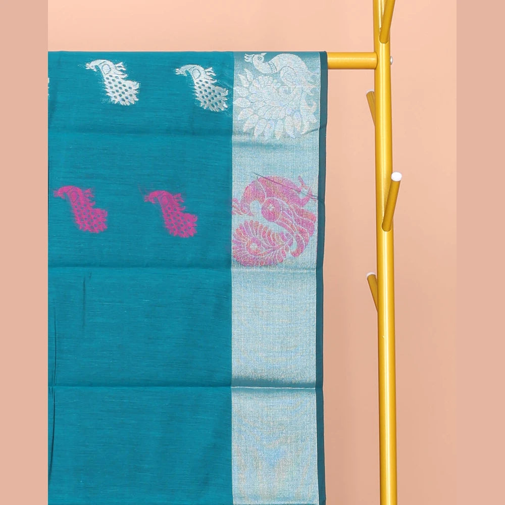 Pothys Blue Semi-Silk Cotton Saree, Beautified with Peacock Buttas All Over Its Body, Highlighted by a Zari Border of Peacocks, Pallu Woven with Peacock Designs, and Paired with a Matching Blouse