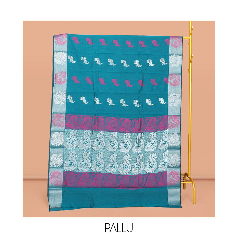 Pothys Blue Semi-Silk Cotton Saree, Beautified with Peacock Buttas All Over Its Body, Highlighted by a Zari Border of Peacocks, Pallu Woven with Peacock Designs, and Paired with a Matching Blouse