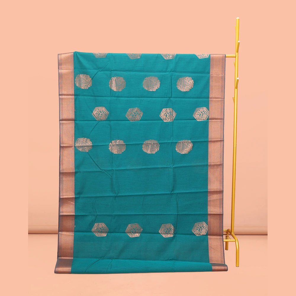 Pothys Rama Blue Semi-Silk Cotton Saree, Spotlighted with Zari Buttas All Over Its Body, Highlighted by a Traditional Zari Border, Pallu of Paisley Designs, and Paired with a Matching Blouse