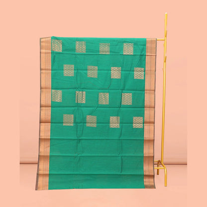 Pothys Green Semi-Silk Cotton Saree, Featuring Zari Buttas All Over Its Body, Complemented by a Contrast Traditional Zari Design Border, Pallu of Star Designs, and Paired with a Contrast Blouse