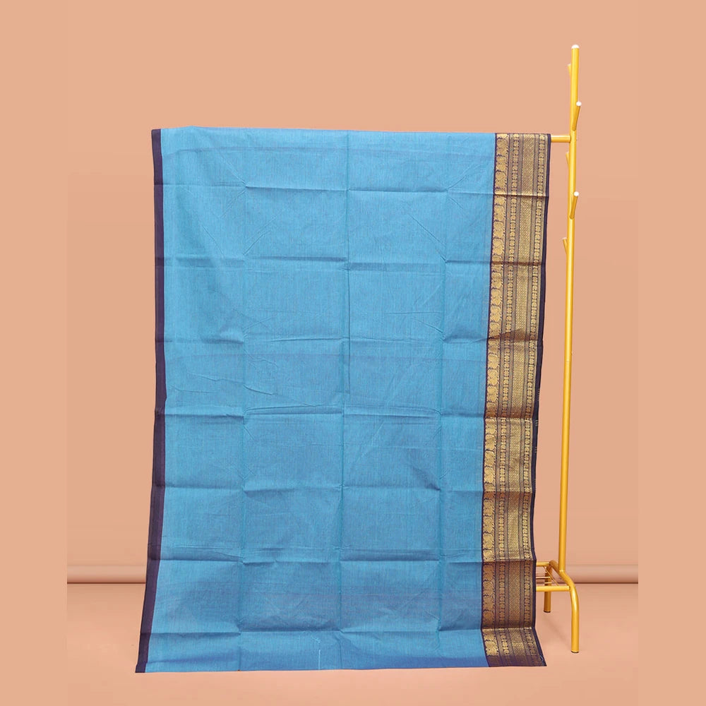 Pothys Blue Plain Chettinad Cotton Saree, Captivating by a Contrast Traditional Zari Design Woven Temple Border, Pallu of Stripes, and Paired with a Matching Blouse