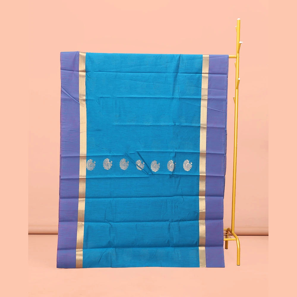 Pothys Blue Semi-Silk Cotton Saree, Gracefully Embellished with Bird Zari Buttas on Its Body, Complemented by Contrast Border of Peacock Buttas, Pallu Features Peacock Designs, and Paired with a Matching Blouse