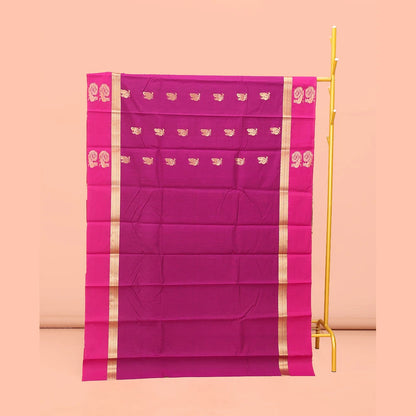 Pothys Rani Pink Semi-Silk Cotton Saree, Artfully Designed with Peacock Zari Buttas on Its Body, Complemented by a Contrast Border of Peacock Designs, Pallu Steeped with Peacock Zari Design, and Paired with a Matching Blouse