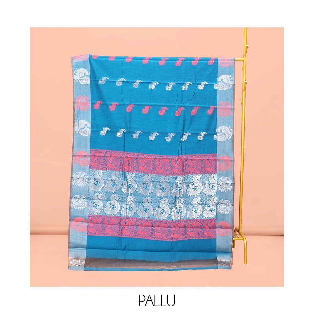 Pothys Blue Semi-Silk Cotton Saree, Graced with Peacock Buttas All Over Its Body, a Self-Border of Peacock Designs, Pallu Steeped with Peacock Zari Design, and Paired with a Matching Blouse
