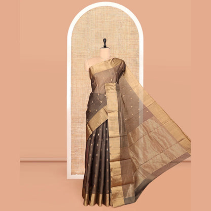Pothys Brown Silk Cotton Saree, Adorned with Buttas, Gleaming Bavanji Border, Pallu Steeped with Stripes, and a Matching Blouse