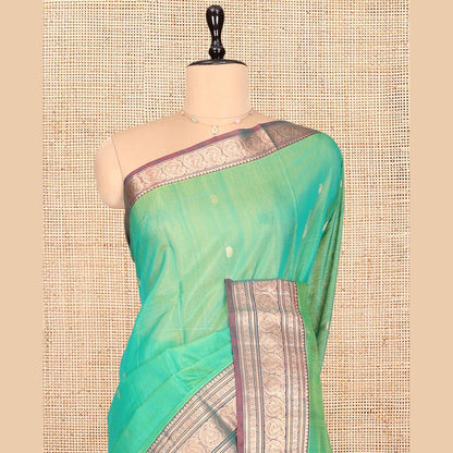 Pothys Sea Green Silk Cotton Saree, Elevated with Buttas, Complemented by Contrast Traditional Paisley Zari Design Border, Zari-Decked Pallu, and a Contrast Blouse