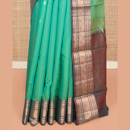 Pothys Sea Green Silk Cotton Saree, Elevated with Buttas, Complemented by Contrast Traditional Paisley Zari Design Border, Zari-Decked Pallu, and a Contrast Blouse