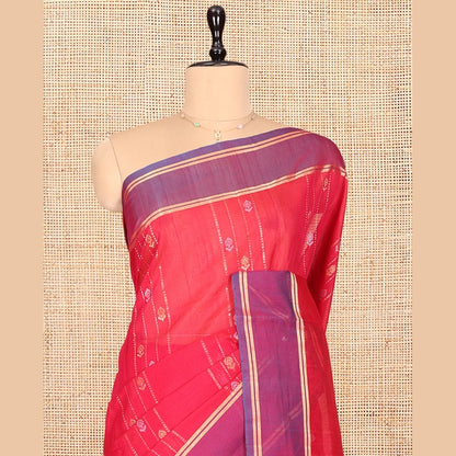 Pothys Red Silk Cotton Saree, Decorated with Zari Stripes and Buttas, Complemented by a Contrast Border, Contrast Butta Enclosed Hexagon Pallu, and a Contrast Blouse