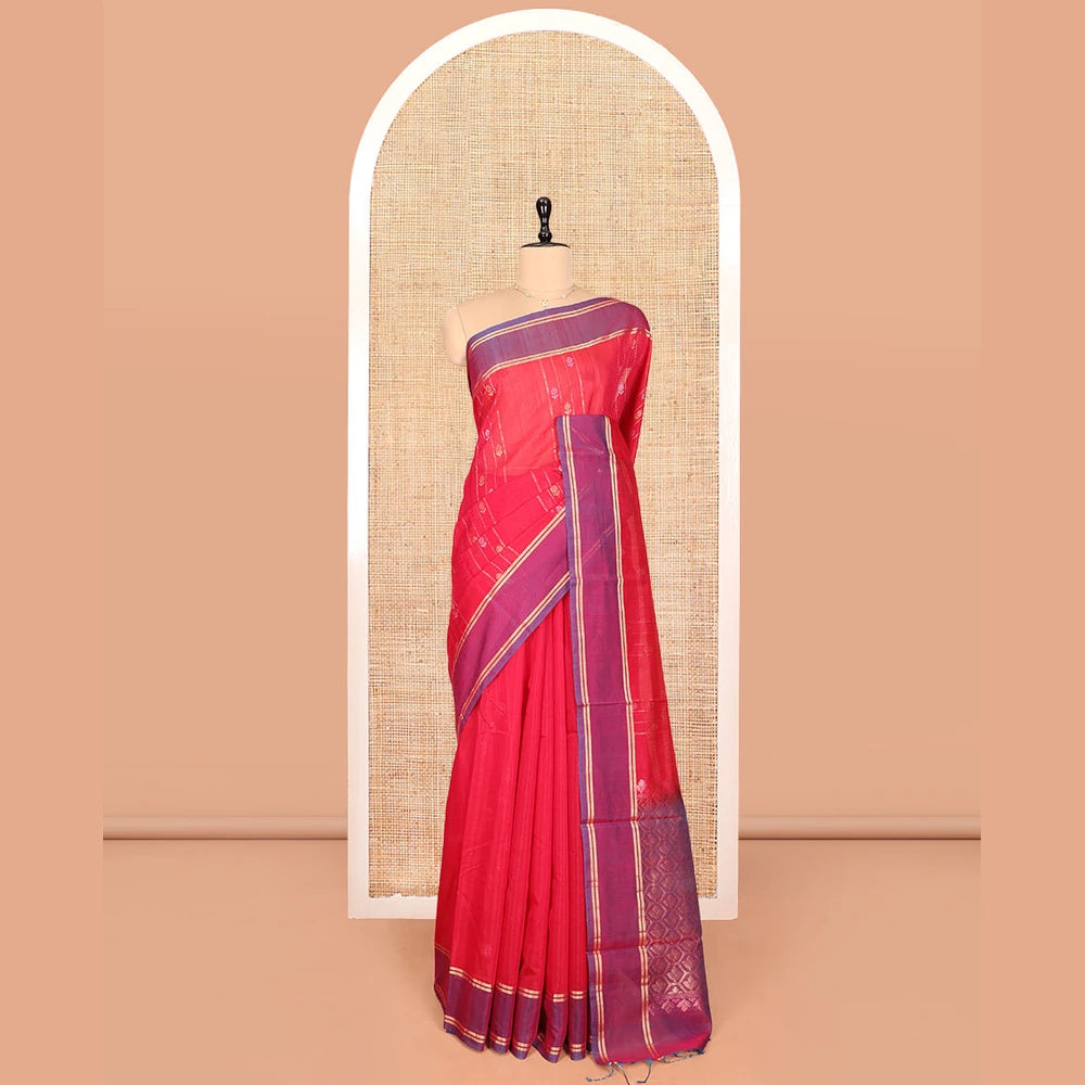 Pothys Red Silk Cotton Saree, Decorated with Zari Stripes and Buttas, Complemented by a Contrast Border, Contrast Butta Enclosed Hexagon Pallu, and a Contrast Blouse