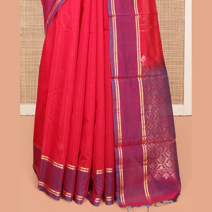 Pothys Red Silk Cotton Saree, Decorated with Zari Stripes and Buttas, Complemented by a Contrast Border, Contrast Butta Enclosed Hexagon Pallu, and a Contrast Blouse