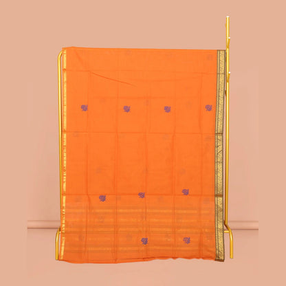 Pothys Orange Venkatagiri Cotton Saree Features Peacock Buttas, a Contrast Zari Border, Pallu of Peacock Buttas and Stripes, and No Blouse