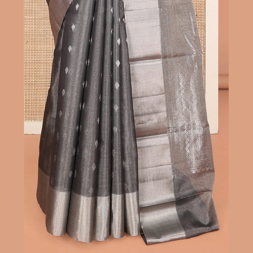 Pothys Grey Silk Cotton Saree, Gleamed up with Buttas, a Subtle Bavanji Border, Grand Geometric Patterned Pallu, and a Matching Blouse