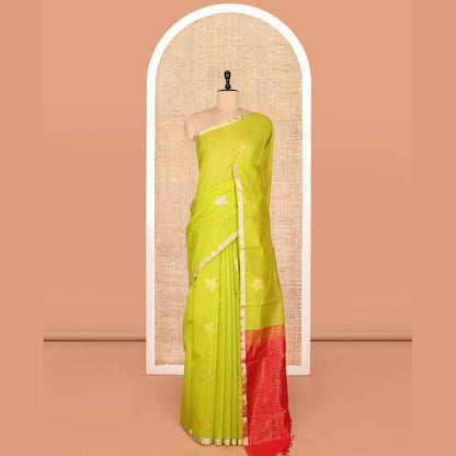 Pothys Leaf Green Silk Cotton Saree, Gleamed Up with Floral Buttas, a Subtle Piping Border, Contrast Pallu of Intricate Designs, and a Contrast Blouse