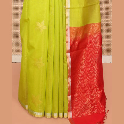 Pothys Leaf Green Silk Cotton Saree, Gleamed Up with Floral Buttas, a Subtle Piping Border, Contrast Pallu of Intricate Designs, and a Contrast Blouse