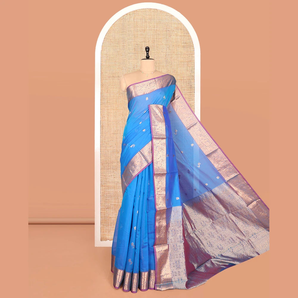 Pothys Blue Silk Cotton Saree, Elevated with Buttas, Complemented by Contrast Floral Creeper Border, Pallu of Intricate Designs, and Contrast Blouse