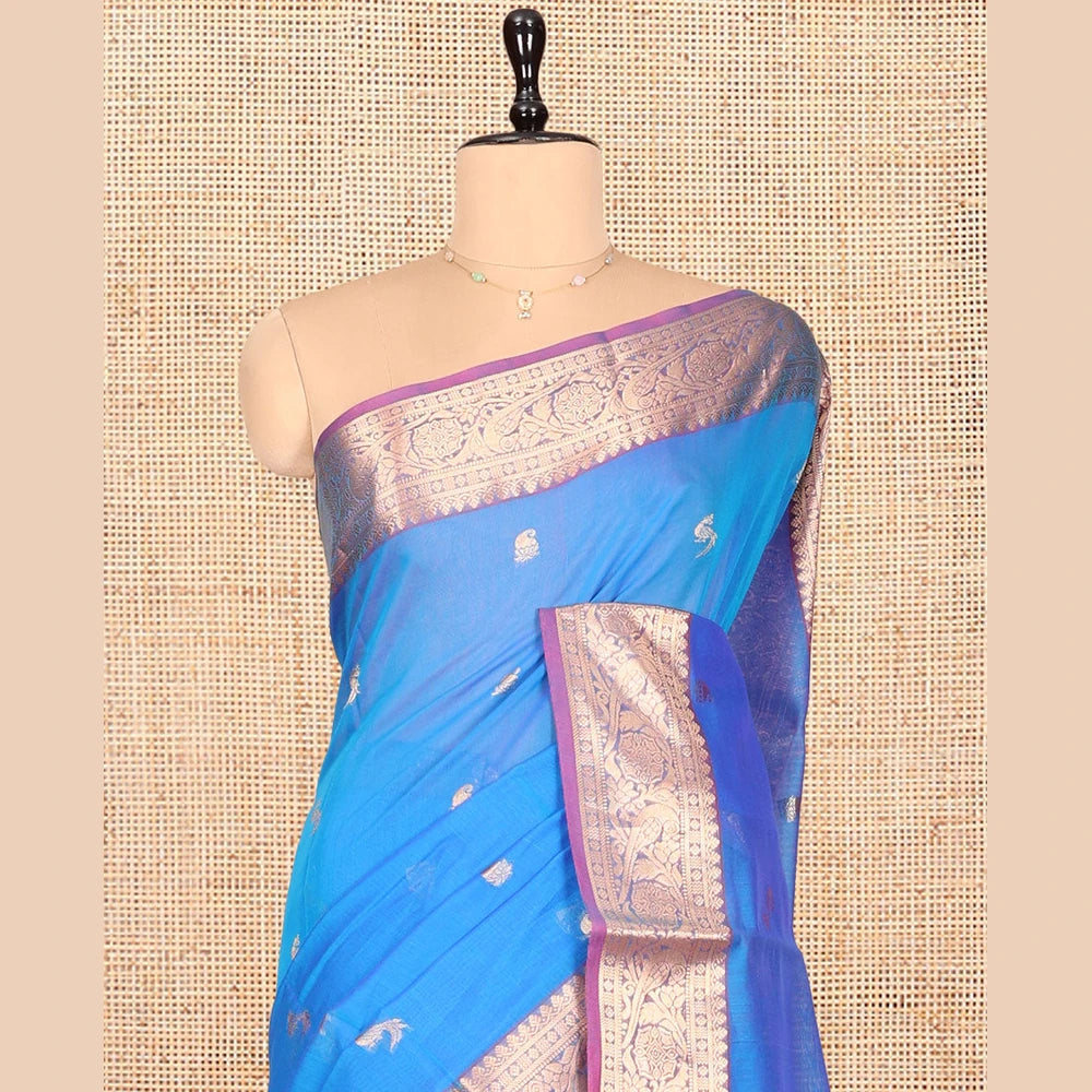 Pothys Blue Silk Cotton Saree, Elevated with Buttas, Complemented by Contrast Floral Creeper Border, Pallu of Intricate Designs, and Contrast Blouse