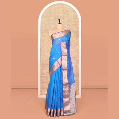 Pothys Blue Silk Cotton Saree, Elevated with Buttas, Complemented by Contrast Floral Creeper Border, Pallu of Intricate Designs, and Contrast Blouse