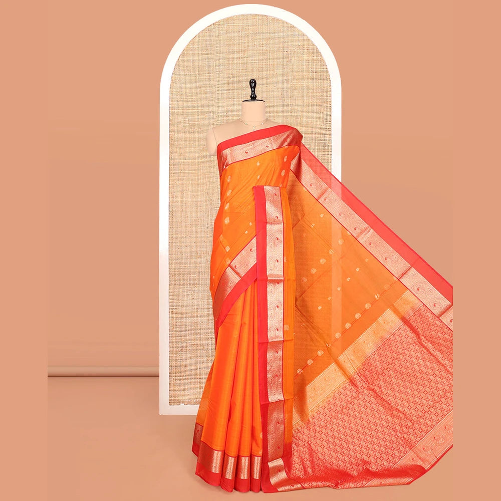 Pothys Orange Silk Cotton Saree, Accentuated with Buttas, a Contrast Traditional Zari Paisley Design Border, Pallu of Intricate Designs, and Contrast Blouse