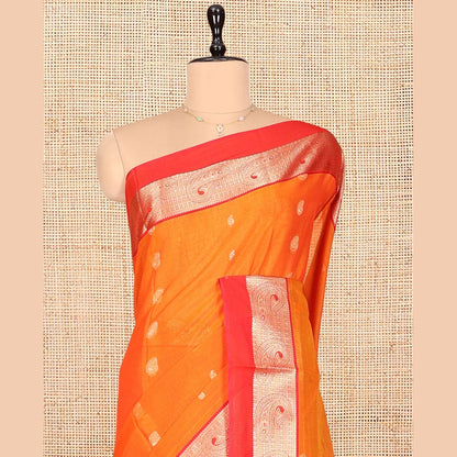 Pothys Orange Silk Cotton Saree, Accentuated with Buttas, a Contrast Traditional Zari Paisley Design Border, Pallu of Intricate Designs, and Contrast Blouse