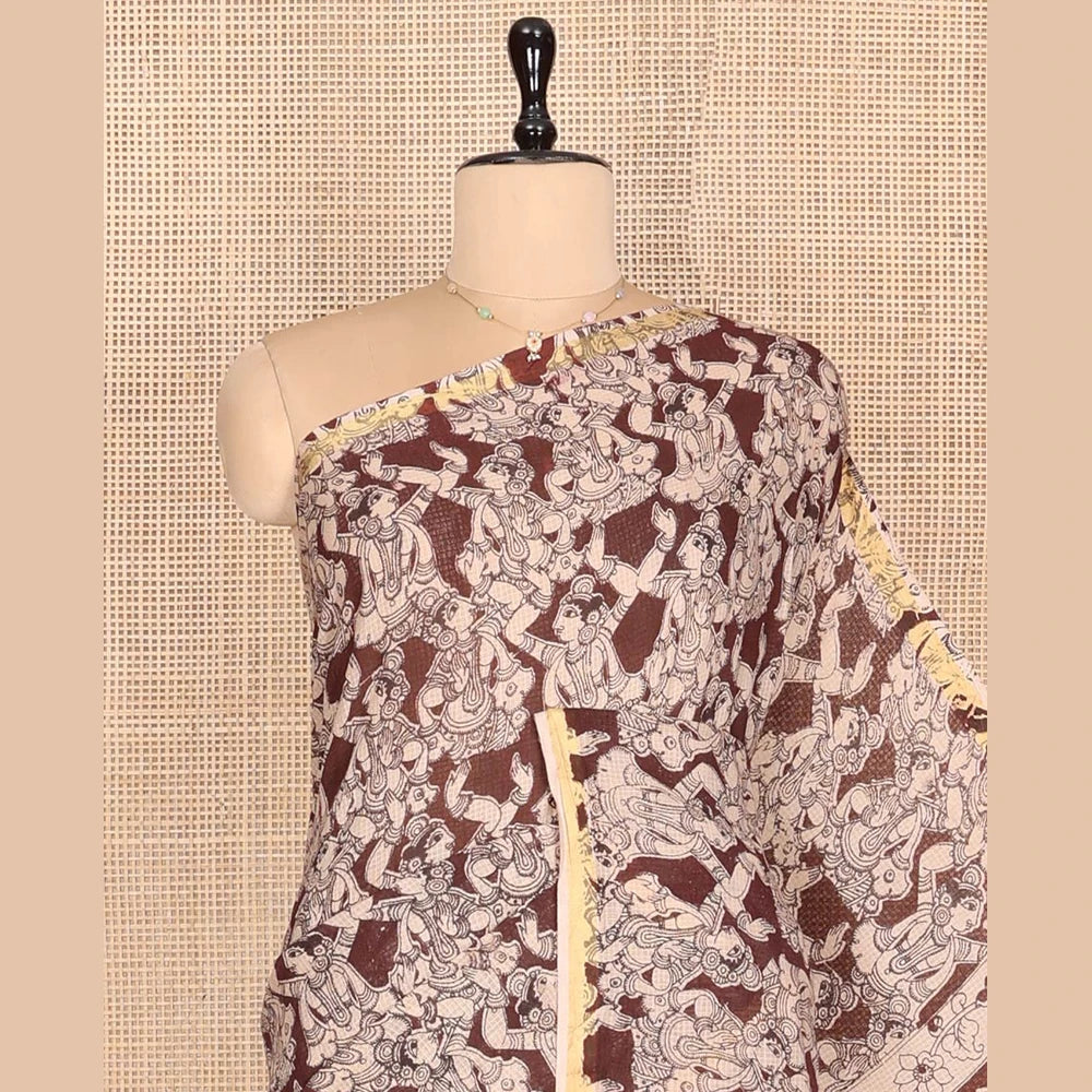 Pothys Brown Machine-Printed Kalamkari Cotton Saree Features Human Motifs, a Piping Border, Pallu of Peacocks, and a Matching Blouse