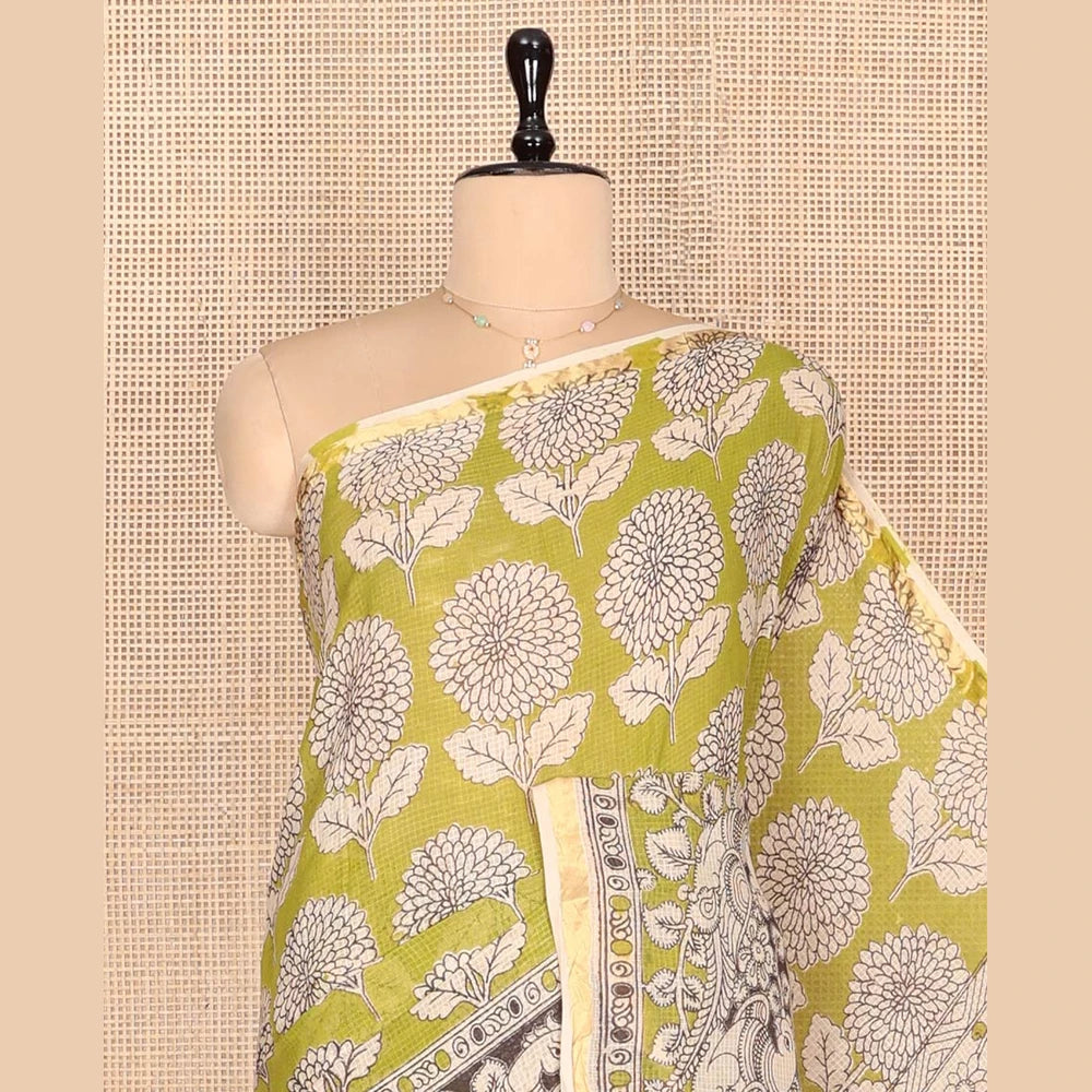 Pothys Green Machine-Printed Kalamkari Cotton Saree Features Floral Motifs, a Piping Border, Pallu of Lord Krishna Motifs, and a Matching Blouse