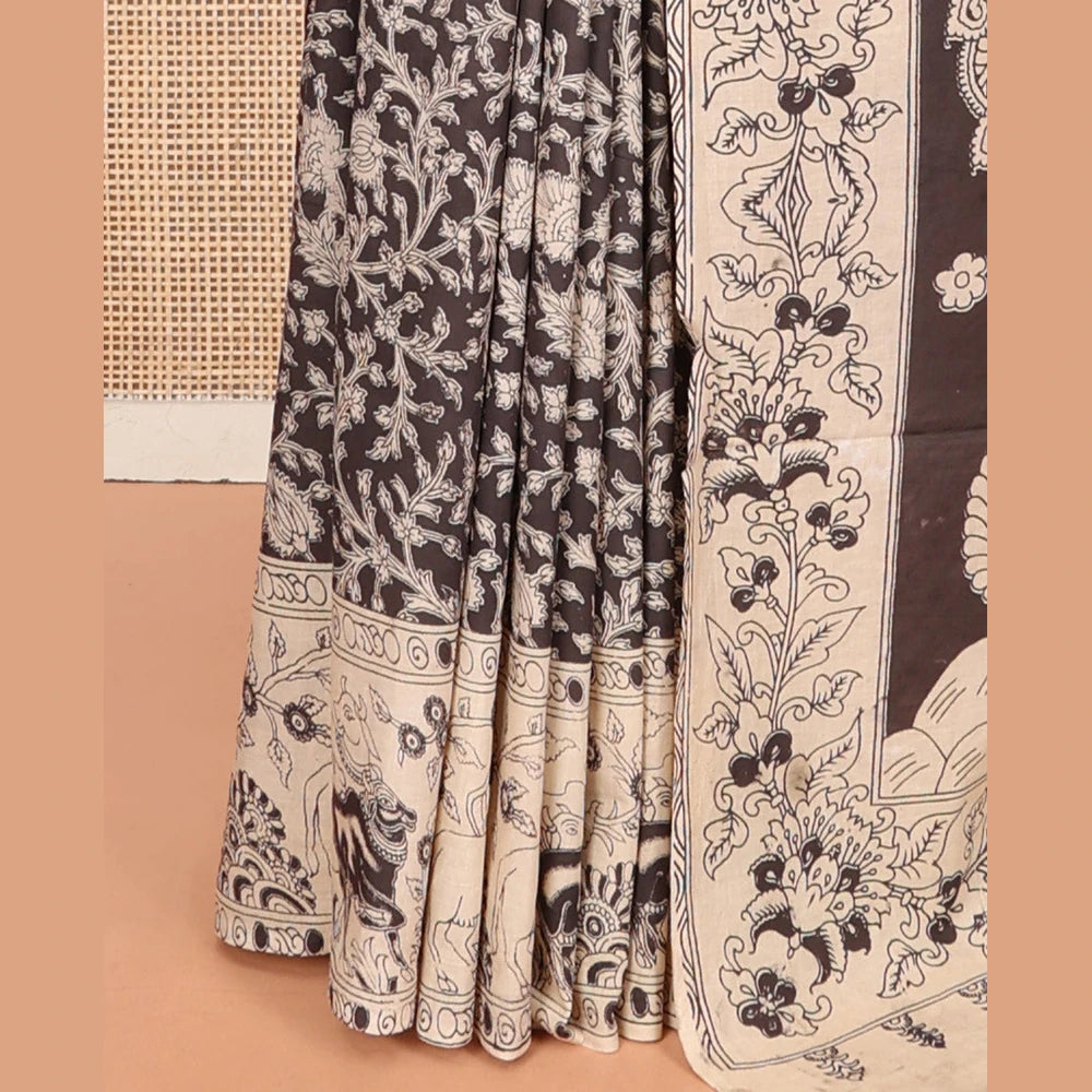 Pothys Black Machine Printed Kalamkari Cotton Saree Features a Floral Vine, Contrast Pichwai-Printed Border, Peacock-Printed Pallu, and a Matching Blouse