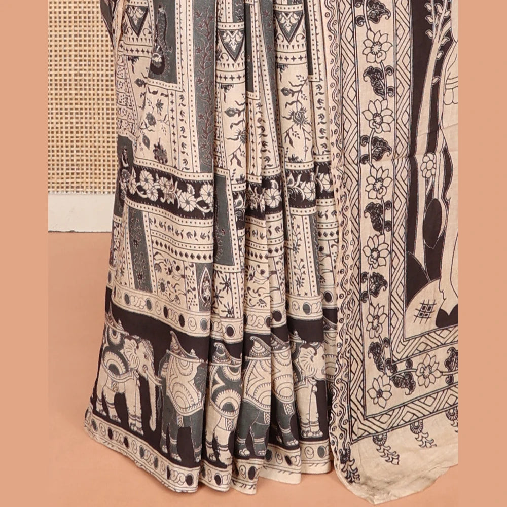 Pothys Sandal-Black Machine-Printed Kalamkari Cotton Saree Features Unique Motifs, an Elephant-Printed Border, a Pallu of Lord Krishna Motifs, and a Matching Blouse