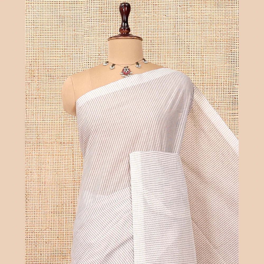 Pothys Borderless Off-White Jute Cotton Saree, Sparsely Woven with Stripes, a Self-Pallu Depicts Peacock Designs, and a Matching Blouse