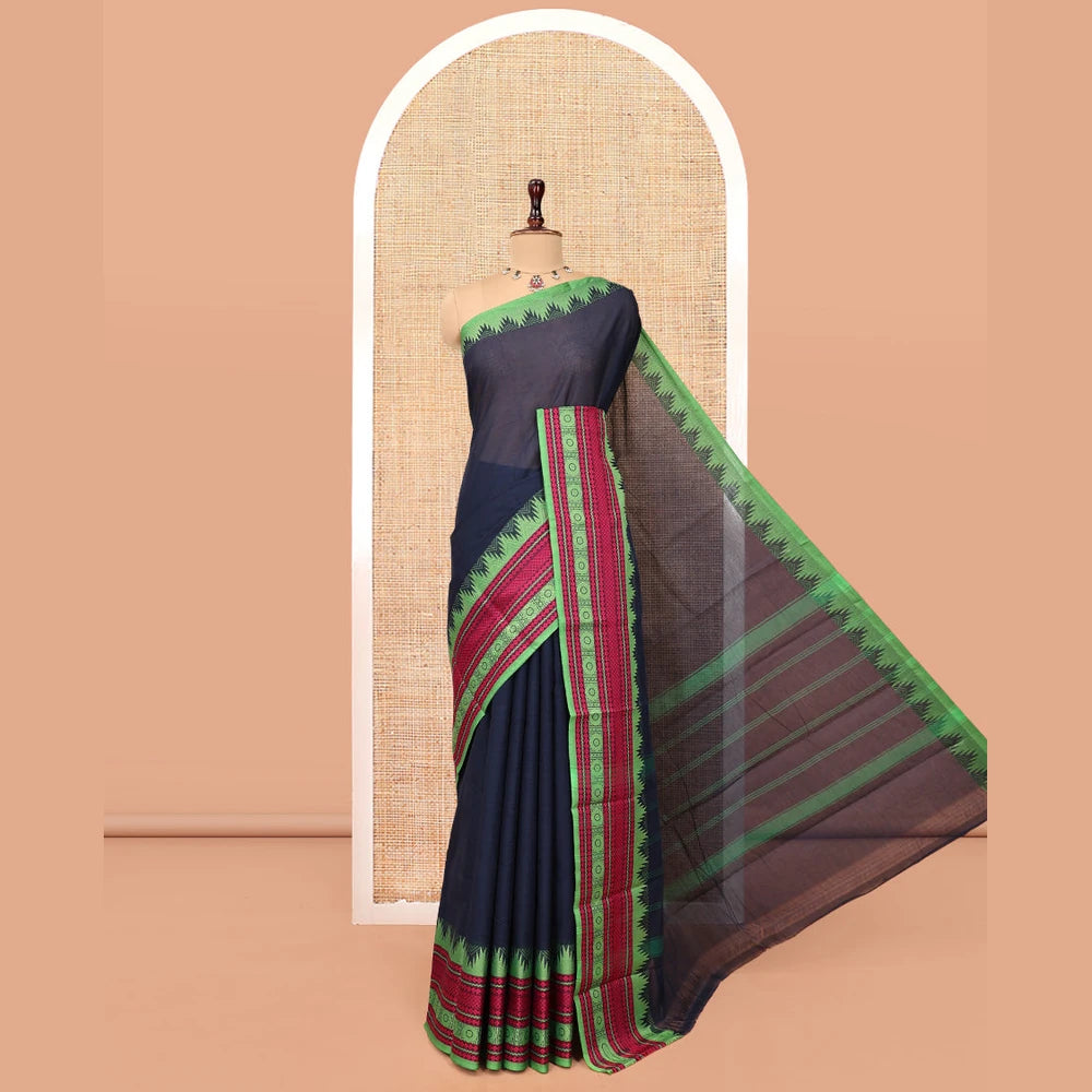 Pothys Navy Blue Plain Chettinad Cotton Saree, Complemented by Contrast Temple Traditional Motifs Thread-Woven Border, Striped Pallu, and a Matching Blouse