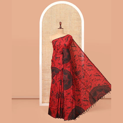 Pothys Borderless Red-Black Poly Cotton Saree, Decked Up with Batik Print, a Self-Printed Pallu, and a Matching Blouse