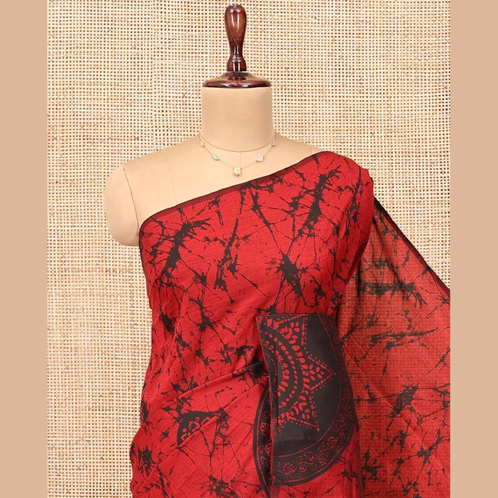 Pothys Borderless Red-Black Poly Cotton Saree, Decked Up with Batik Print, a Self-Printed Pallu, and a Matching Blouse