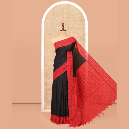 Pothys Black Plain Poly Cotton Saree, Complemented by a Contrast Jaal-Printed Border, Pallu, and a Contrast Blouse