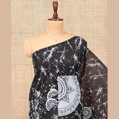 Pothys Borderless Black-Grey Poly Cotton Saree, Decked Up with Batik Print, a Self-Printed Pallu, and a Matching Blouse