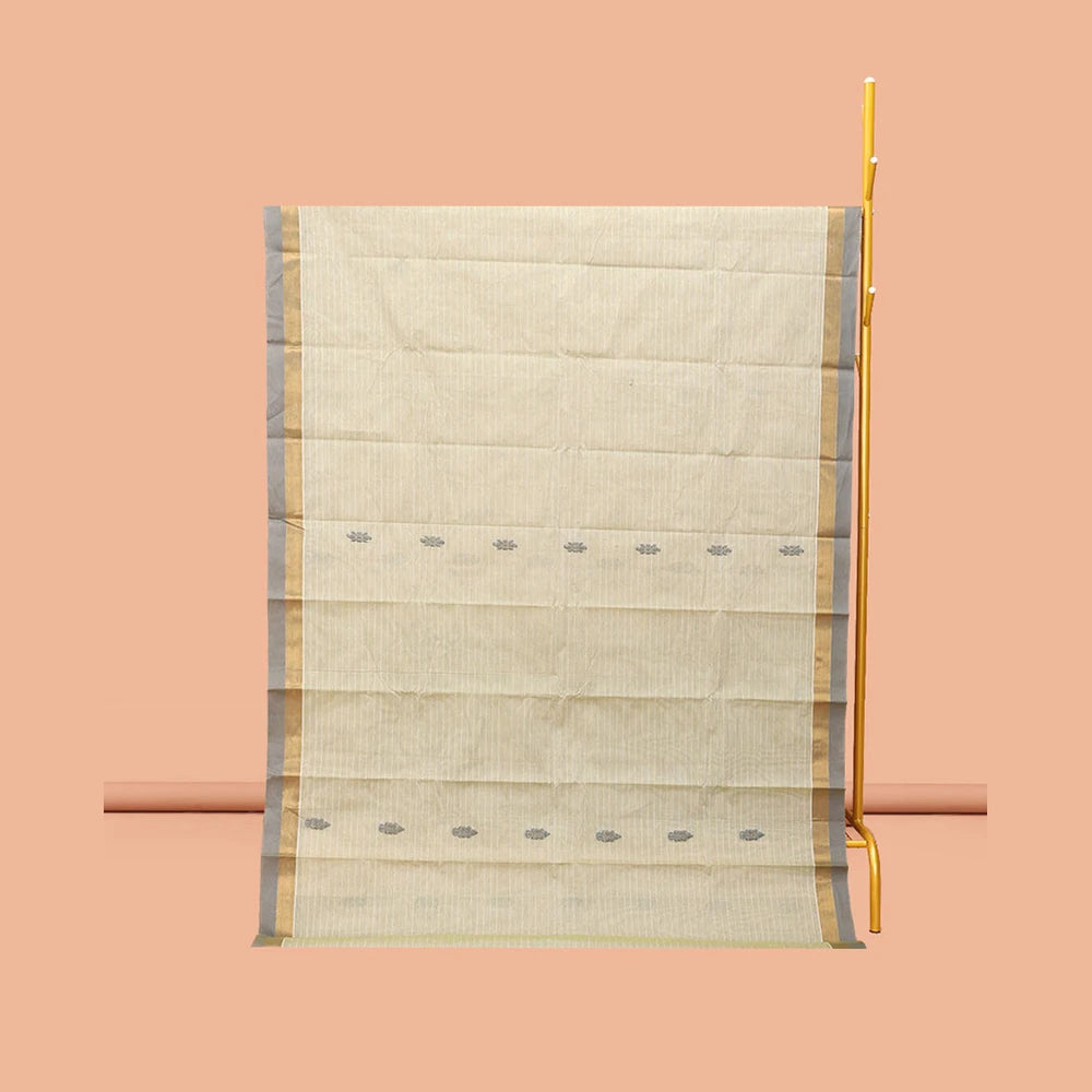 Pothys Off-White Kanchi Cotton Saree, Accentuated with Buttas, Complemented by a Contrast Border, Ogee Patterned Pallu, and a Matching Blouse