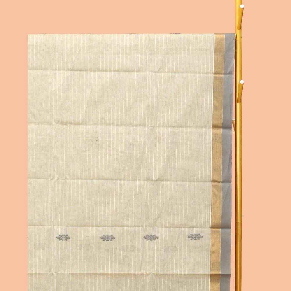 Pothys Off-White Kanchi Cotton Saree, Accentuated with Buttas, Complemented by a Contrast Border, Ogee Patterned Pallu, and a Matching Blouse
