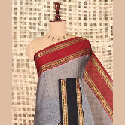 Pothys Grey Plain Mercerised Cotton Saree, Contrast Ganga-Jamuna Temple Rudraksha Border, Striped Pallu, and a Matching Blouse