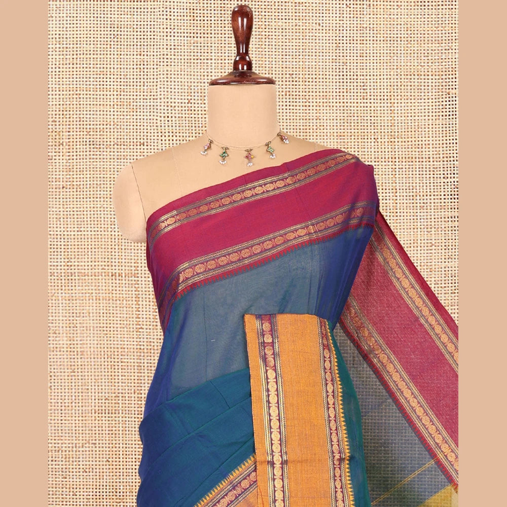 Pothys Blue Plain Mercerised Cotton Saree, Contrast Ganga-Jamuna Temple Rudraksha Border, Striped Pallu, and a Matching Blouse