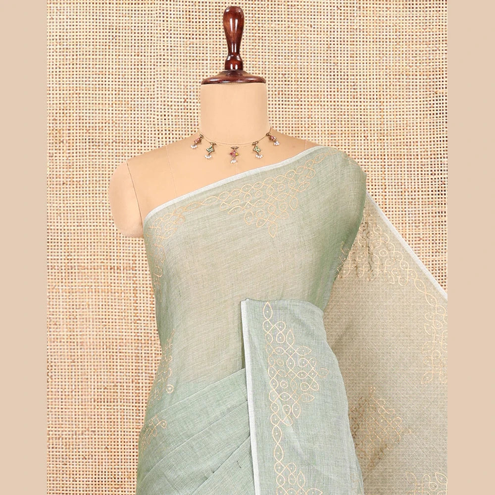 Pothys Borderless Pista Green Khadi Mul Cotton Saree Features Kambi Kolam Motifs, a Self-Pallu, and No Blouse