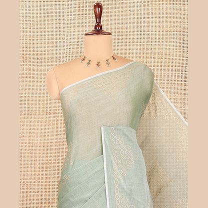 Pothys Borderless Pista Green Khadi Mul Cotton Saree Features Kambi Kolam Motifs, a Self-Pallu, and No Blouse