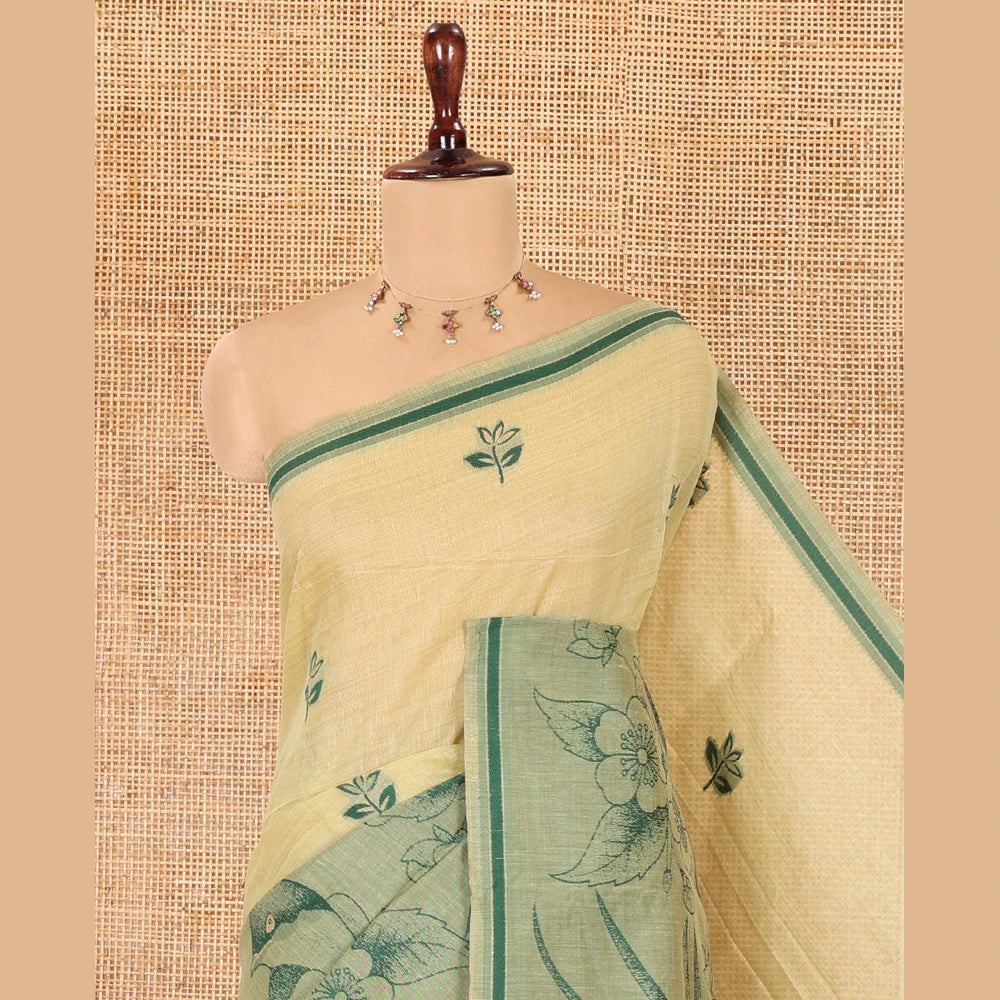 Pothys Green Munga Cotton Saree, Beautified with Floral Buttas, a Contrast Floral-Bird Printed Border, and a Matching Blouse