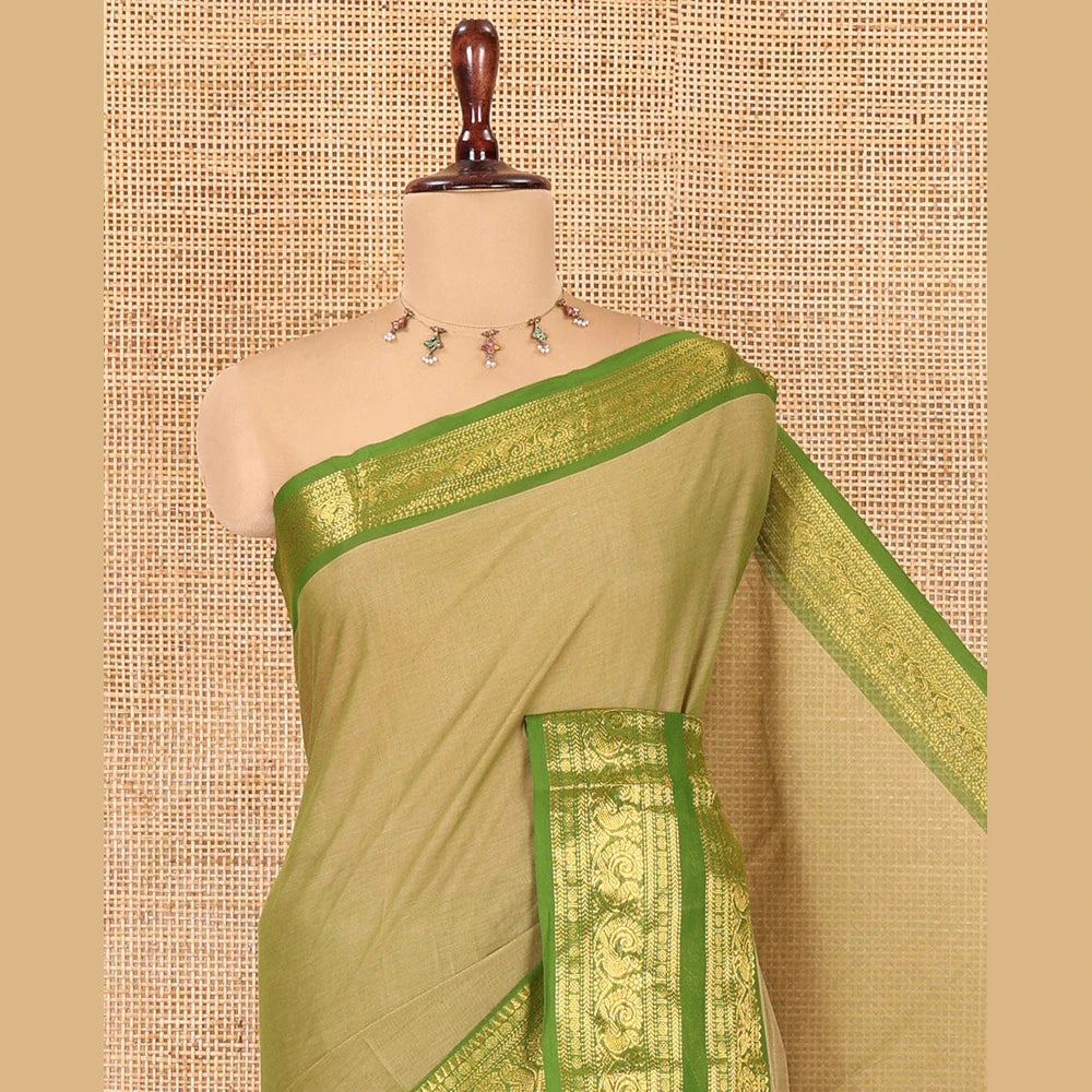 Pothys Green Plain Chettinad Cotton Saree, a Contrast Traditional Rettai Pettu Temple Border, Striped Palu, and a Matching Blouse