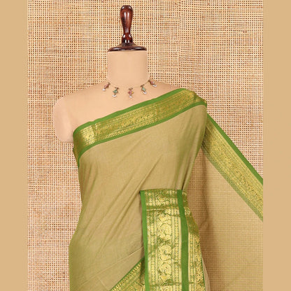 Pothys Green Plain Chettinad Cotton Saree, a Contrast Traditional Rettai Pettu Temple Border, Striped Palu, and a Matching Blouse