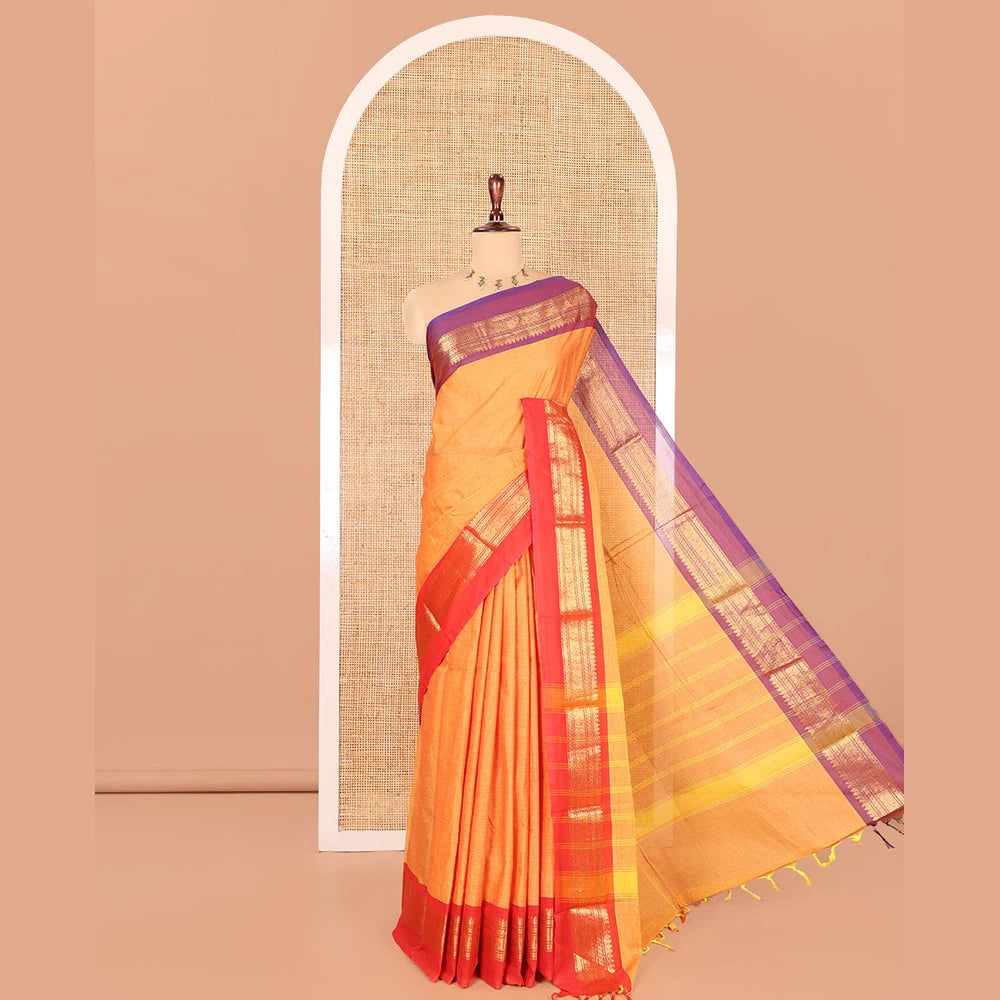 Pothys Mustard Plain Chettinad Cotton Saree, a Contrast Kal Eragina Traditional Ganga-Jamuna Border, Striped Pallu, and a Matching Blouse